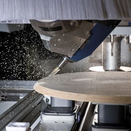 Wood processing Trim a chamfer on a table plate