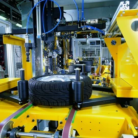 Assembly and balancing systems Assembly and balancing system for wheels and tires