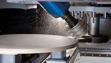 Five-axis-technology Five-axis processing of a table plate